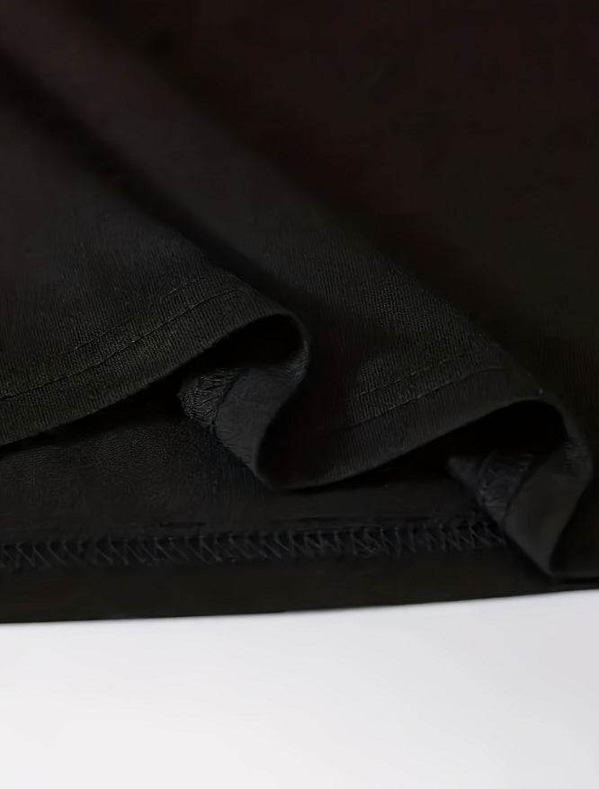 Close-up of black cotton fabric detail on Christian graphic tee from Holy Mango Store
