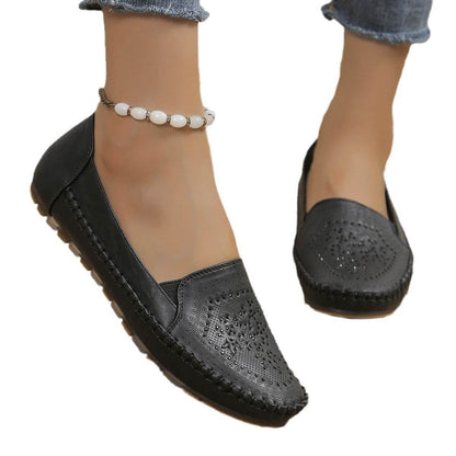 Holy Mango Store black casual slip-on shoes for women with perforated floral design and comfortable sole