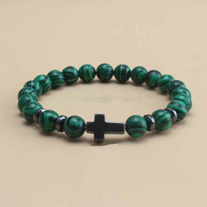 Christian malachite bracelet with green beads and black cross centerpiece from Holy Mango Store