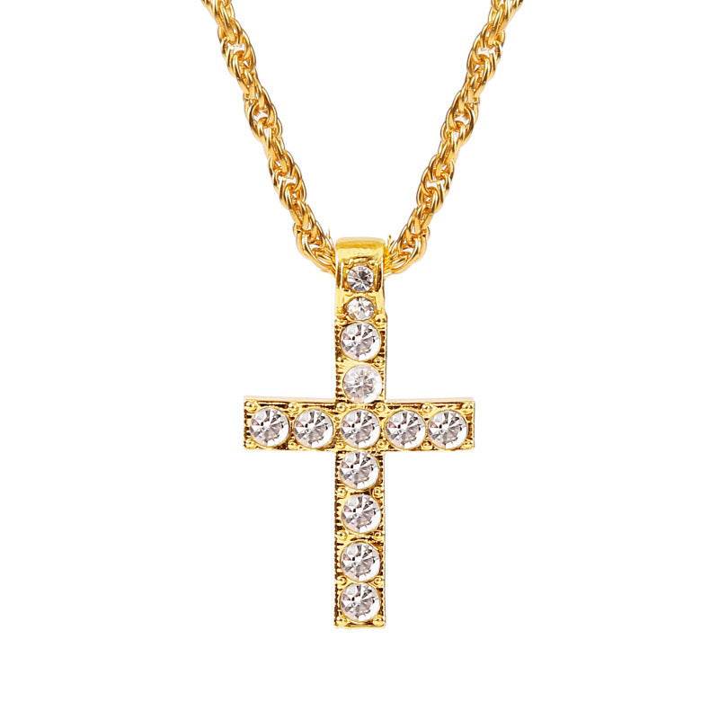 Gold cross pendant necklace with sparkling clear stones on a twisted chain from Holy Mango Store