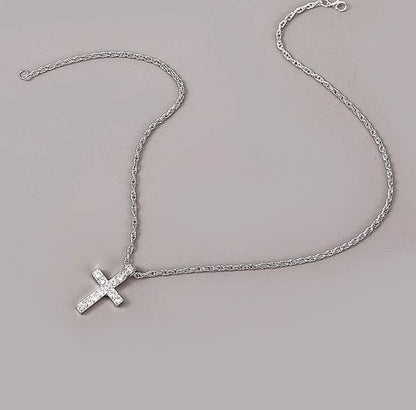 Silver cross pendant necklace with detailed chain from Holy Mango Store blessed goods collection