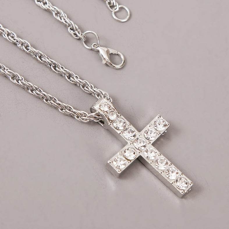 Silver cross pendant necklace with clear rhinestones on twisted chain from Holy Mango Store