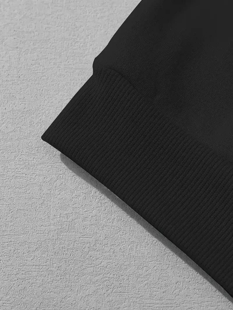 Close-up of black faith hoodie for women sleeve cuff from Holy Mango Store Blessed Goods