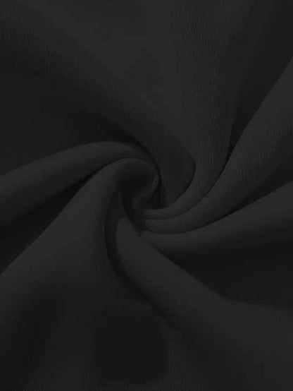 Close-up of black fabric texture for faith hoodie for women from Holy Mango Store Blessed Goods