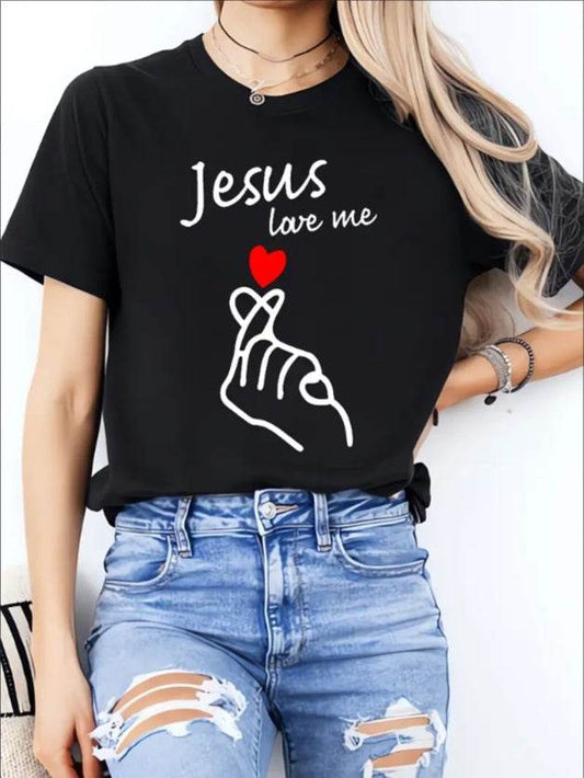 Black faith inspired casual tee with Jesus love me graphic and red heart worn with ripped jeans