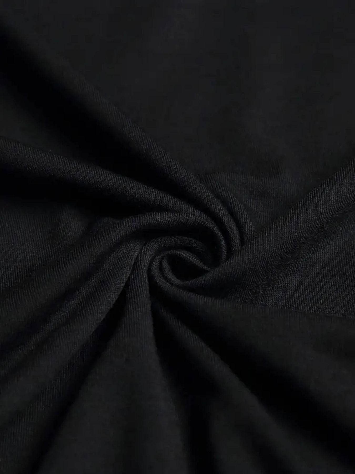 Close-up of black fabric texture for faith print t-shirt for men from Holy Mango Store