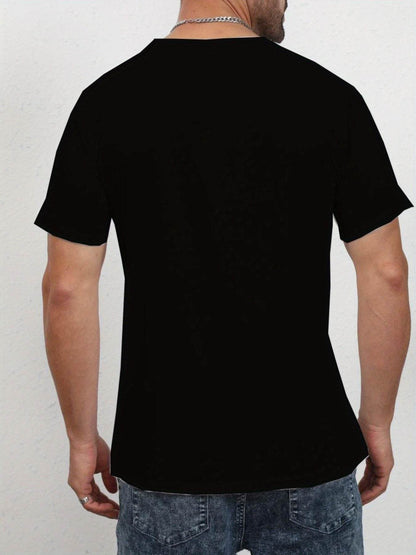 Back view of faith print t-shirt for men in black worn by man with chain necklace and jeans