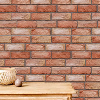 Holy Mango Store 3D brick wall decals for home in red brown brick pattern behind wooden shelf with basket