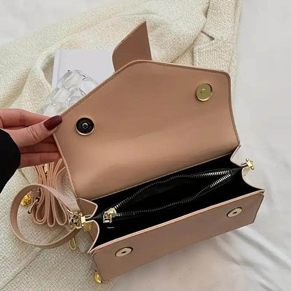 Holy Mango Store nude small crossbody purse for everyday use open showing interior zip pocket and gold hardware