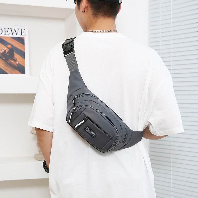 Holy Mango Store mens crossbody bag with multiple pockets worn over shoulder in black