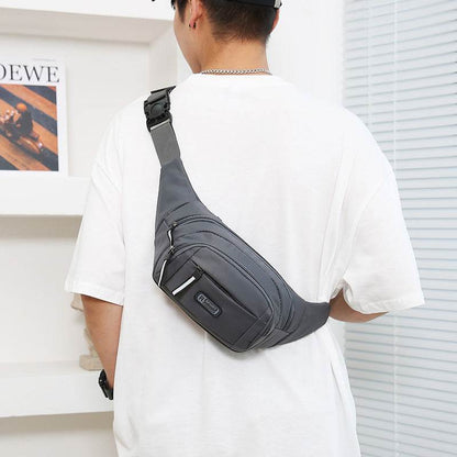 Holy Mango Store mens crossbody bag with multiple pockets worn over shoulder in black