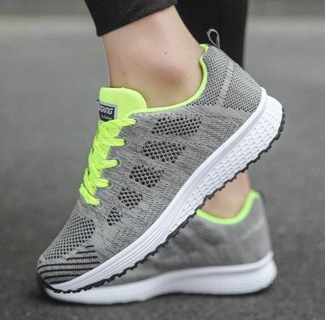 Holy Mango Store women's lightweight sports sneakers in gray with neon green accents and breathable mesh design