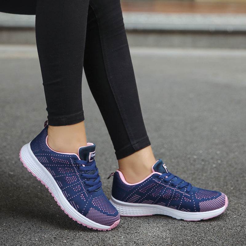 Holy Mango Store women's lightweight sports sneakers in navy blue with pink accents and white soles
