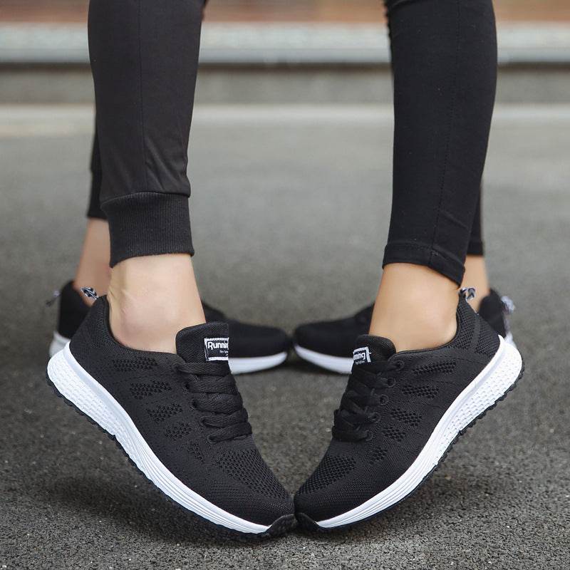 Holy Mango Store women's lightweight sports sneakers in black with breathable knit upper and white sole