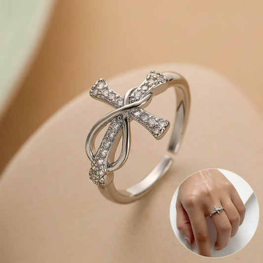 Elegant copper cross ring with embedded crystals and a sleek design from Holy Mango Store