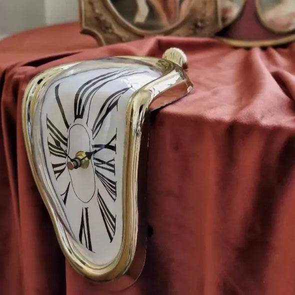 Holy Mango Store DALI inspired melting clock draped over table edge gold rim Roman numerals