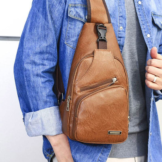 Holy Mango Store men's USB charging chest bag brown faux leather sling worn crossbody with front zip pockets