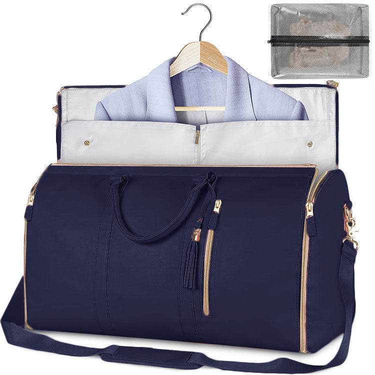 Holy Mango Store navy womens carry on duffle bag with garment compartment showing hanging blazer and gold zippers