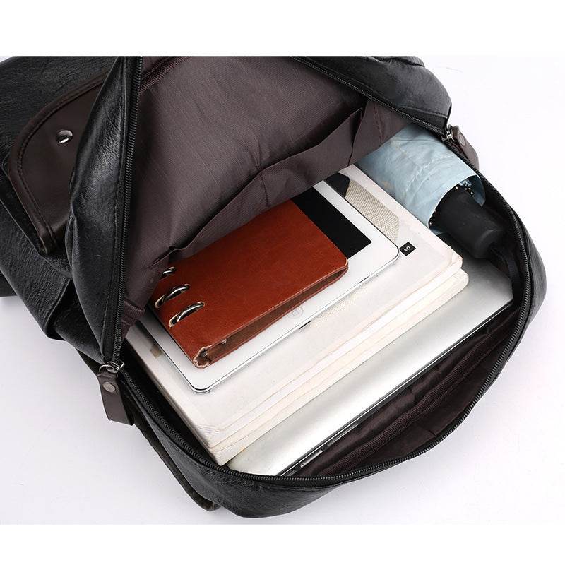 Holy Mango Store black leather laptop backpack for school open showing laptop tablet notebook and umbrella