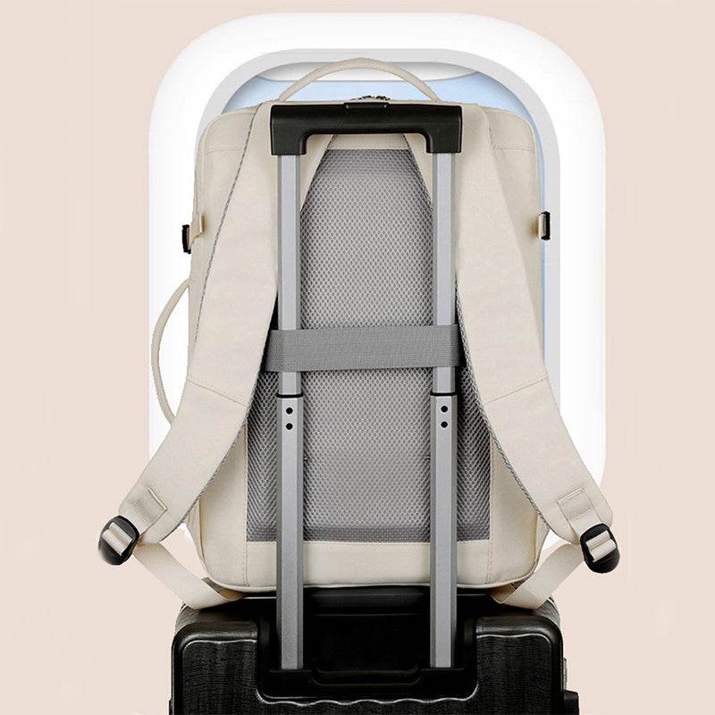 Holy Mango Store beige large capacity travel backpack on suitcase with trolley sleeve and padded back panel