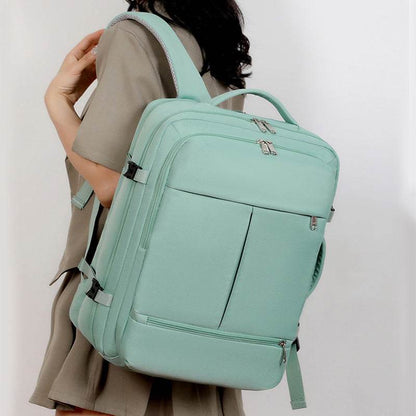 Holy Mango Store mint green large capacity travel backpack with multiple compartments and padded straps