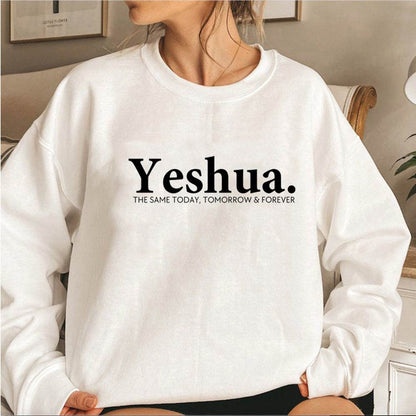 White vintage Yeshua sweatshirt from Holy Mango Store with black faith-based text design