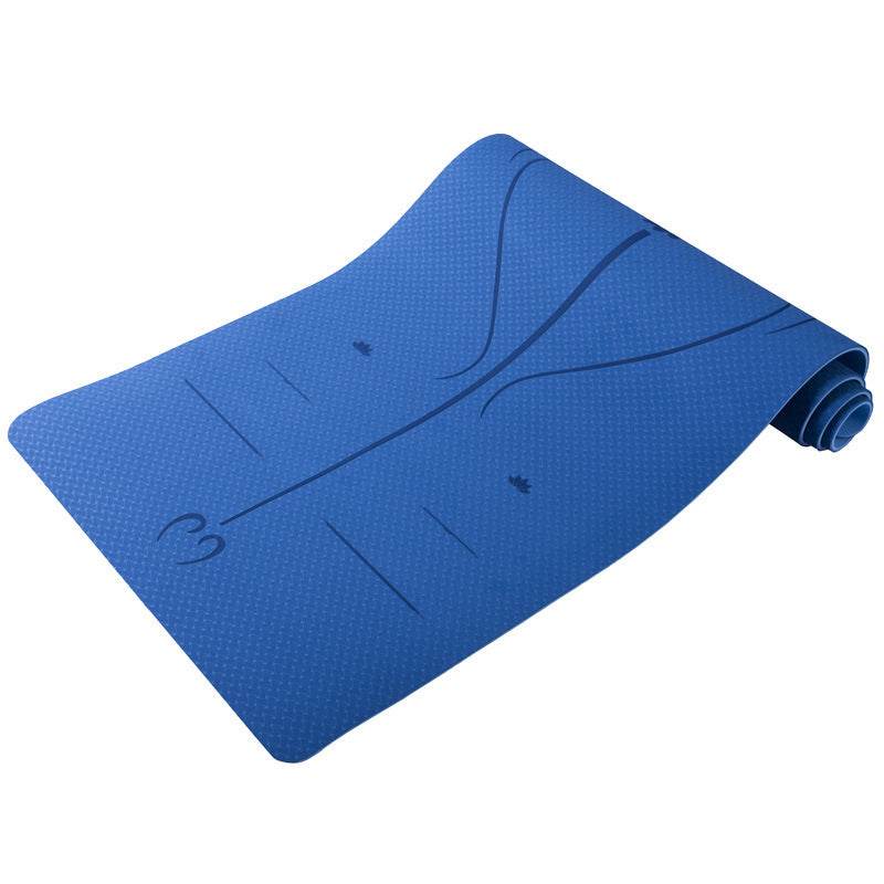 Holy Mango Store blue textured yoga mat with alignment lines rolled partway ideal for yoga backpack with mat holder